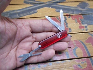 Victorinox Classic SD Swiss Army Knife 58mm Ruby Translucent - Picture 1 of 5