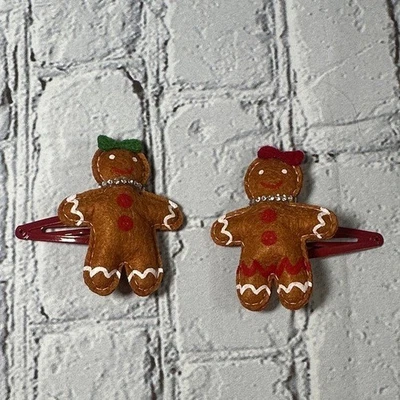 Pinzas para el cabello navideñas de pan de jengibre Foto 1 de 4