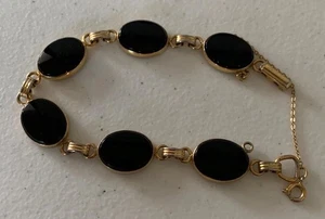 "Brazalete de seguridad vintage Sarah Coventry de ónix negro tono dorado de 7""" - Imagen 1 de 7