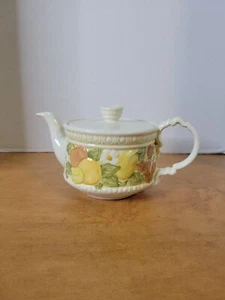 Metlox-poppytrail teapot. Outside is designed with orange yellow and brown... - Picture 1 of 9
