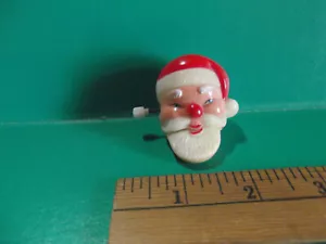 Clip avvolgibile sul bavero bocca movimento BABBO NATALE 2"in "giallito" - Foto 1 di 6