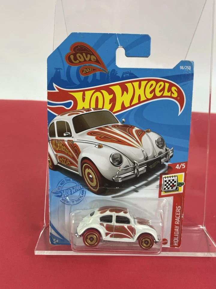 VW Beetle Holiday Racers #4/5 2011 Hot Wheels con estuche protector Foto 1 de 4