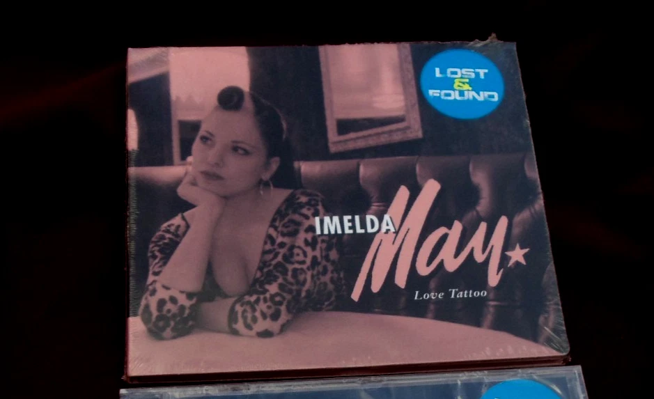 IMELDA MAY "LOVE TATTOO" CD 12 TRACKS NEU - ovp - Bild 1 von 1