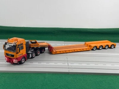 WSI truck models, MAN TGX XXL 8X4 + Euro Lowloader 4 Axle + Interdolly ,BAUTRANS - Image 1 of 4