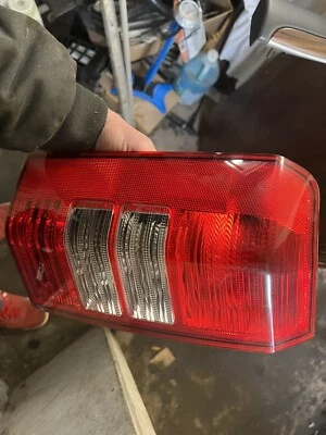 2008-2016 jeep patriot LH drivers side rear halogen tail light assembly OEM 09 - Image 1 of 4