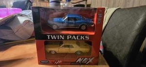 Welly 1965 Gold Pontiac GTO 1967 Blue Firebird NEX Twin Pack Die Cast 1:43 NIB - Picture 1 of 3