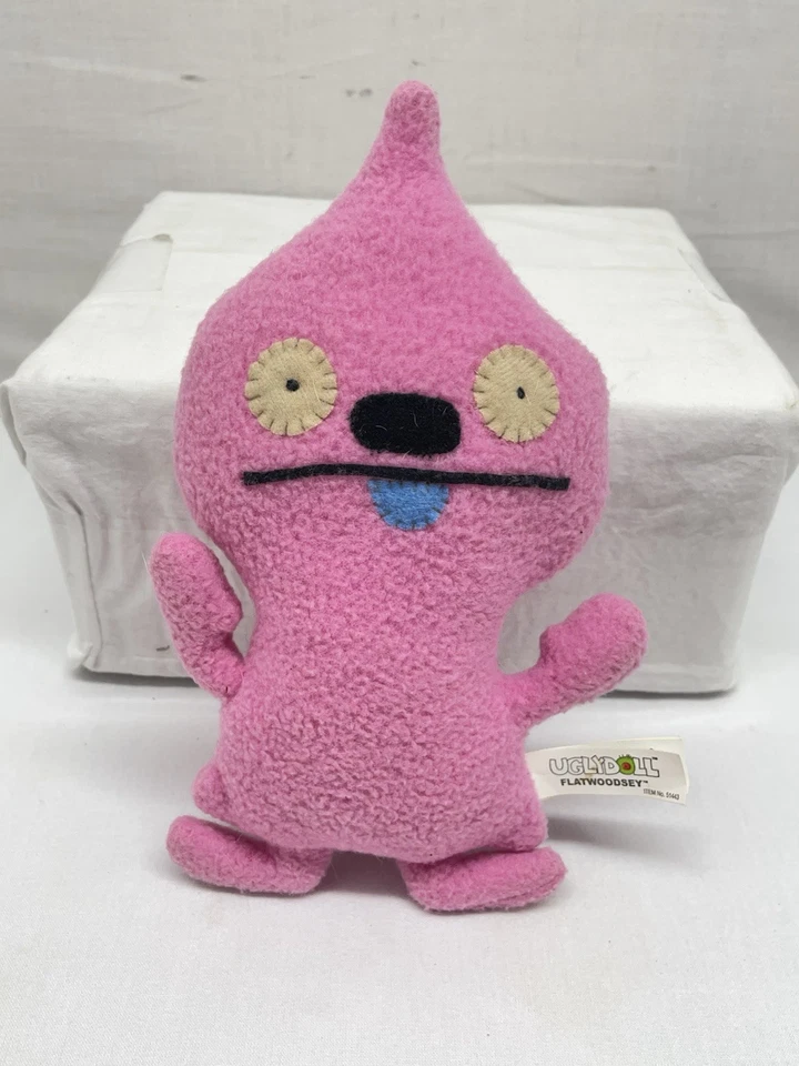 Boneco de pelúcia Uglydoll Classic Flatwoodsey pequeno rosa 8"" - Imagem 1 de 4