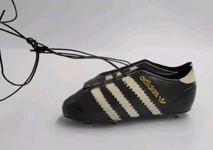 Vintage Adidas Mini Rubber Hanging Display Shoes Souvenir Gold Black Rare - Picture 1 of 7