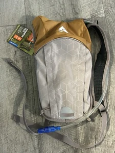 Ozark Trail 2 Liter Hiking Hydration Backpack w Water Reservoir Camel Pack NEW - Picture 1 of 4