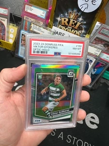 2023-24 PANINI PRIZM OPTIC VIKTOR GYOKERES DONRUSS SOCCER #159 (RC) PSA NM-MT 8 - Photo 1/2