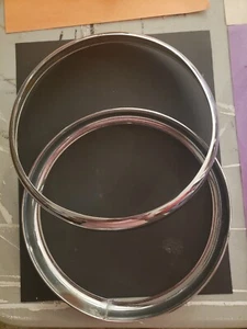 2 USED OEM CHROMED BRASS OUTER HEADLAMP RIMS. - Picture 1 of 1