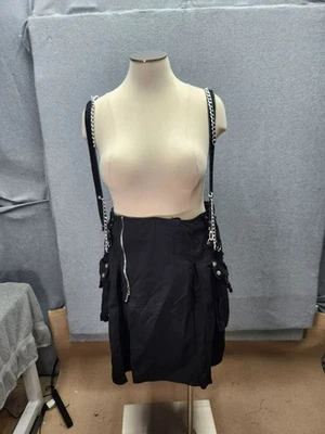 Falda Tripp negra bondage con tirantes de cadena y bolsillos Foto 1 de 4
