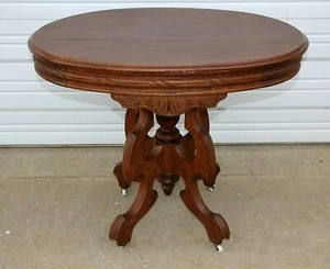 Antique Victorian Walnut Wood Oval Carved Parlor Table Finial Porcelain Casters - Picture 1 of 5