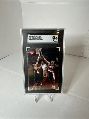 1998 Upper Deck mjx - Michael Jordan #113 3rd Quarter Highlights SGC 9 - Image 1 of 2