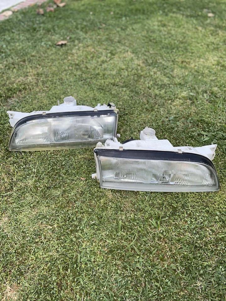 Luces de cabeza de vidrio JDM RHD 1994-1996 Infiniti Q45 G50 Kouki OEM ICHIKOH 1480 Foto 1 de 4
