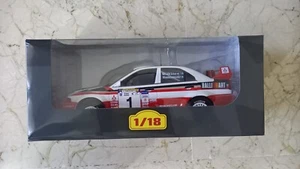 Mitsubishi Lancer Evo V Rally Argentina 1998 a 1/18 - Imagen 1 de 2