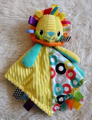 Cobertor de segurança Bright Starts Taggies Lion Lovey pelúcia bebê etiquetas multicoloridas - Imagem 1 de 4