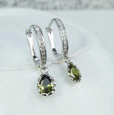 Ausgezeichnete Damen Ohrringen vergoldet Gold 18K/750  Grüne Peridot +Topas - Bild 1 von 2