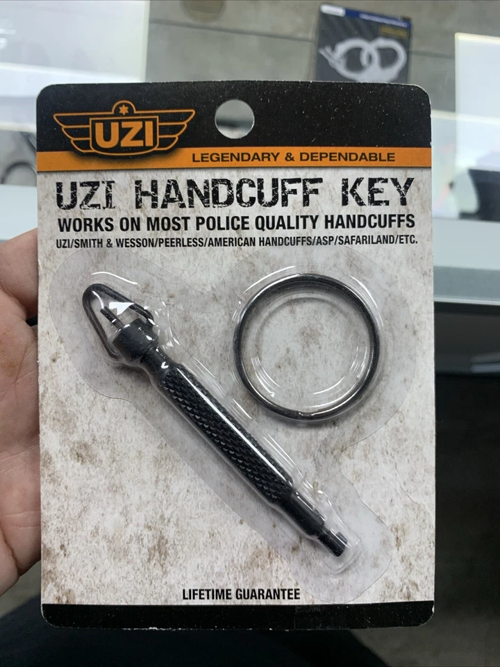 Llave esposada giratoria UZI con llaveros pequeños y grandes #UZI-KEY-ROTATE Foto 1 de 1