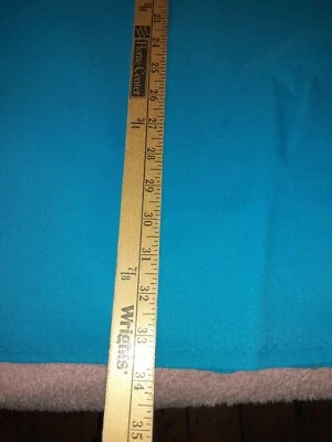  SOLID TURQUOISE POLYESTER BLEND FABRIC 66"W 1 3/4 LONG - Image 1 of 2