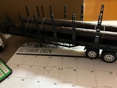 NEW RAY BLACK NEW LOG HAULER TRAILER, NO PACKAGING #B 680 - Image 1 of 4