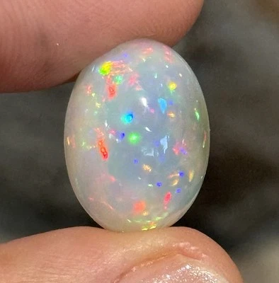 10.9ct 18x13.2x8.5mm Finest Colorful Pin Fire Ethiopian Welo Opal Oval Cabochon - Image 1 of 4