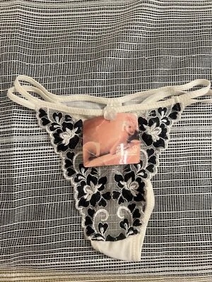 VINTAGE FEMINA COLLECTION THONG SIZE M 80% NYLON 20% SPANDEX NYLON TRANSPARENT - Image 1 of 4