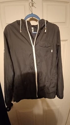 Chaqueta cortavientos VANS para mujer pequeña gris ligera forrada de malla Foto 1 de 4