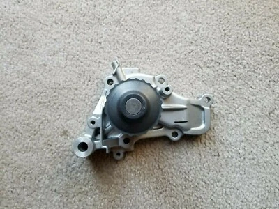 New OEM 1993-96 Mitsubishi Mirage Engine Water Pump Assembly MD300799 - Image 1 of 3