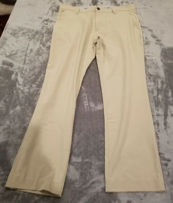 Pantalones chinos Adidas para mujer beige pierna recta talla 32 tiro medio frente plano informales Foto 1 de 4