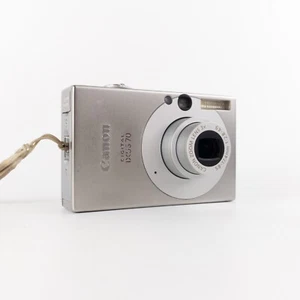 Canon IXUS 70/PowerShot Digital ELPH SD1000 7.1MP Digital Camera - Silver_ - Foto 1 di 13
