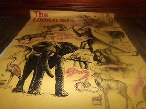 Vintage Buch Werbeplakat The LOOKALIKES Elephants Monkeys Snakes 1971 - Bild 1 von 8