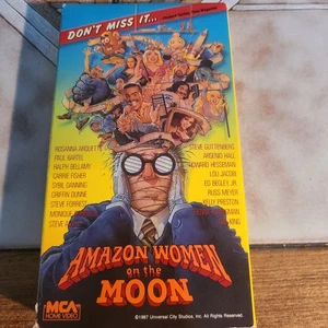 Amazon Women on the Moon VHS Rosanna Marquette Carrie Fischer Howard Hessman - Picture 1 of 5