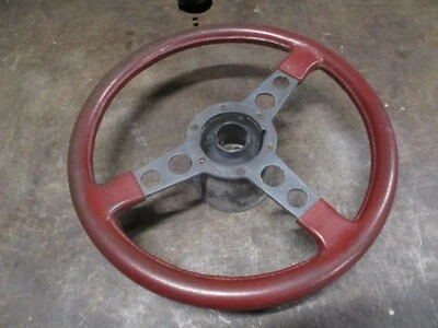 70 71 72 73 74 75 76 77 78 79 80 81 TRANS AM VOLANTE ROJO OEM BUEN ESTADO Foto 1 de 4