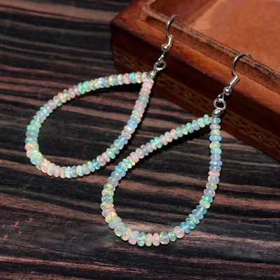 Orecchino pendente con pietra preziosa liscia rondelle da 4 mm con opale di... - Immagine 1 di 2