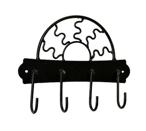 Porta llaves de metal con cuatro ganchos, diseño de sol - 6,25" H X 7 7/8" W. - Imagen 1 de 4