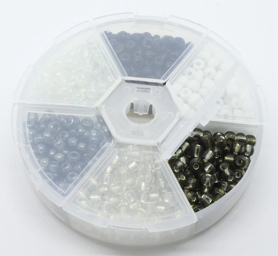 A small box of assorted  4mm Glass Seed Beads. Approx 700 beads.   seed17 - Image 1 of 1