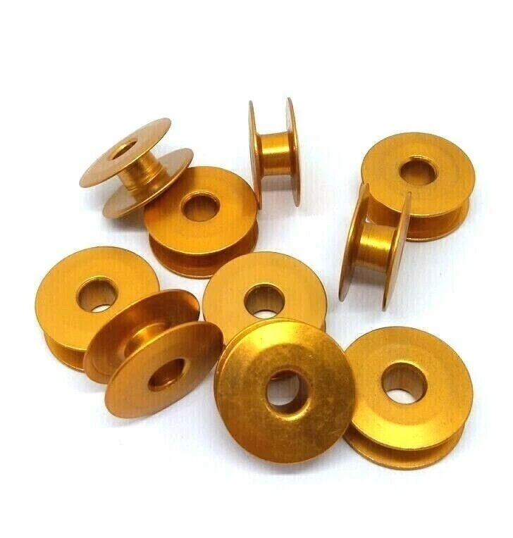 10X Bobbin (alum.), yellow/gold color #272152-Y for All Plain Sewers - Image 1 of 1