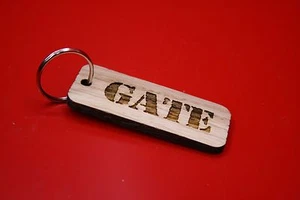 Llavero puerta roble corte grabado láser - Imagen 1 de 4
