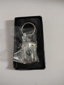 Sutherlin Nissan of Florida Car Truck Dealers Logo Emblem Keychain Key Ring A1 - Picture 1 of 6