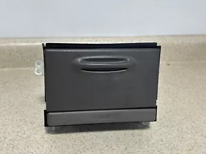 Cubo de almacenamiento para tablero central Toyota Corolla 98-02 GRIS OSCURO OEM - Imagen 1 de 4