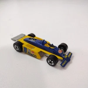 Hot Wheels Mattel Formula 1 #18 STP, auto da corsa stereo Kraco pressofusa Malesia 1982 - Foto 1 di 9