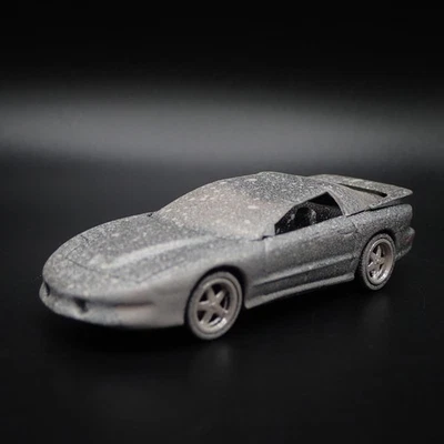 Modello Auto Diecast 1:64 PONTIAC FIREBIRD T/A TA ROLLOVER Abbandonata 1997 - Immagine 1 di 4