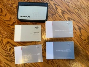 2007 Nissan Versa Owners Manual set with case - Picture 1 of 1