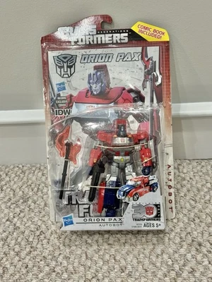 Orion Pax com Quadrinhos Emocionantes 30 Gerações Transformers 2012 Hasbro NOVO MOSC - Imagem 1 de 2