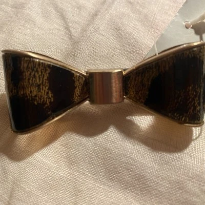 Cinturón ajustado con estampado de leopardo animal Betsey Johnson con arco ribete dorado mediano nuevo con etiquetas Foto 1 de 4