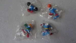 Vintage 4 figurine Izzy, mascotte Olimpiadi di Atlanta 1996, sport estivi, giocattoli Dakin - Foto 1 di 11