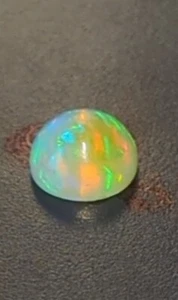 7.1mm Welo Opal Round Cabochon AAA Ethiopian Color Flash Loose VIDEO - Picture 1 of 5