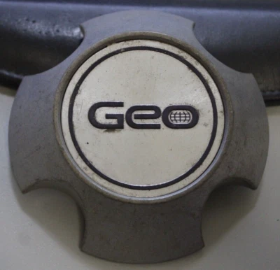 89 90 91 92 Geo Prizm OEM Center Hub Cap 60141 Silver ( no metal ring ) - Image 1 of 4