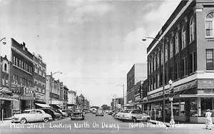 North Platte NE Main Street Storefronts Old Cars Postcard - Picture 1 of 1